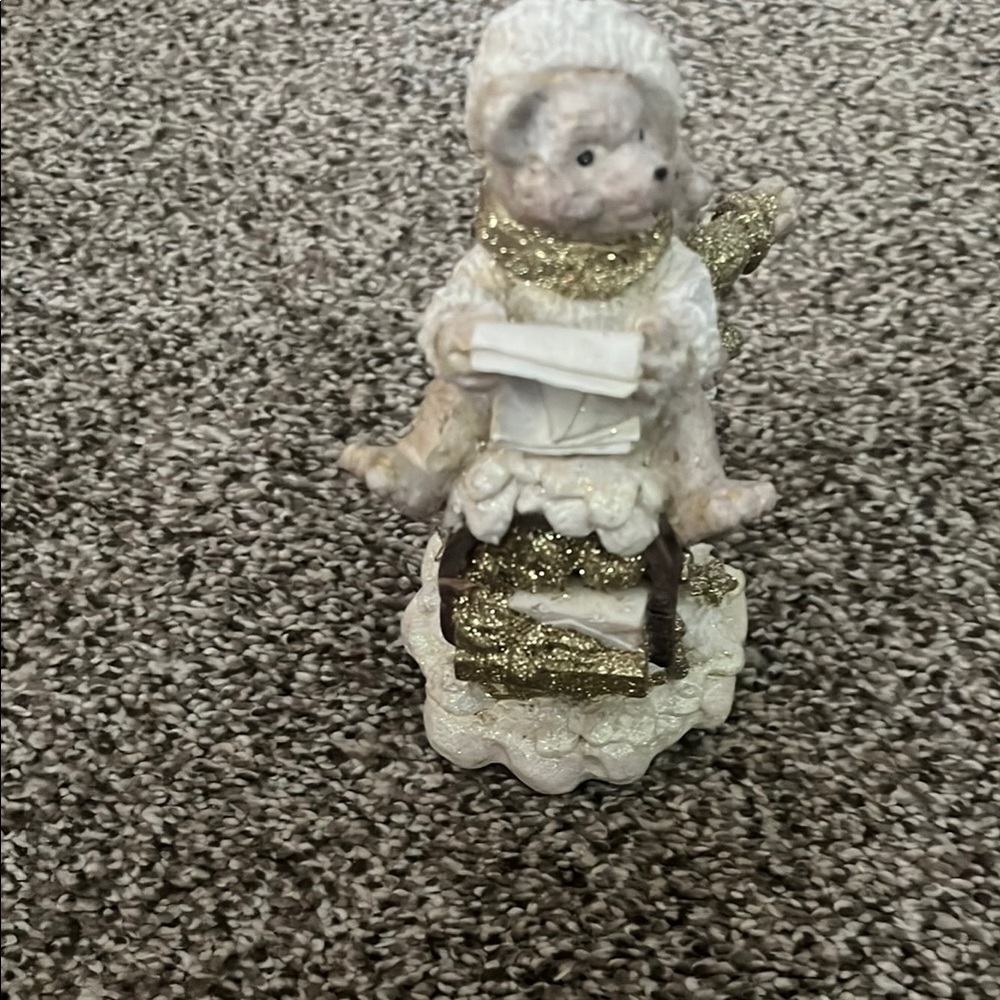 Gold and White Bear Figurine on a mailbox